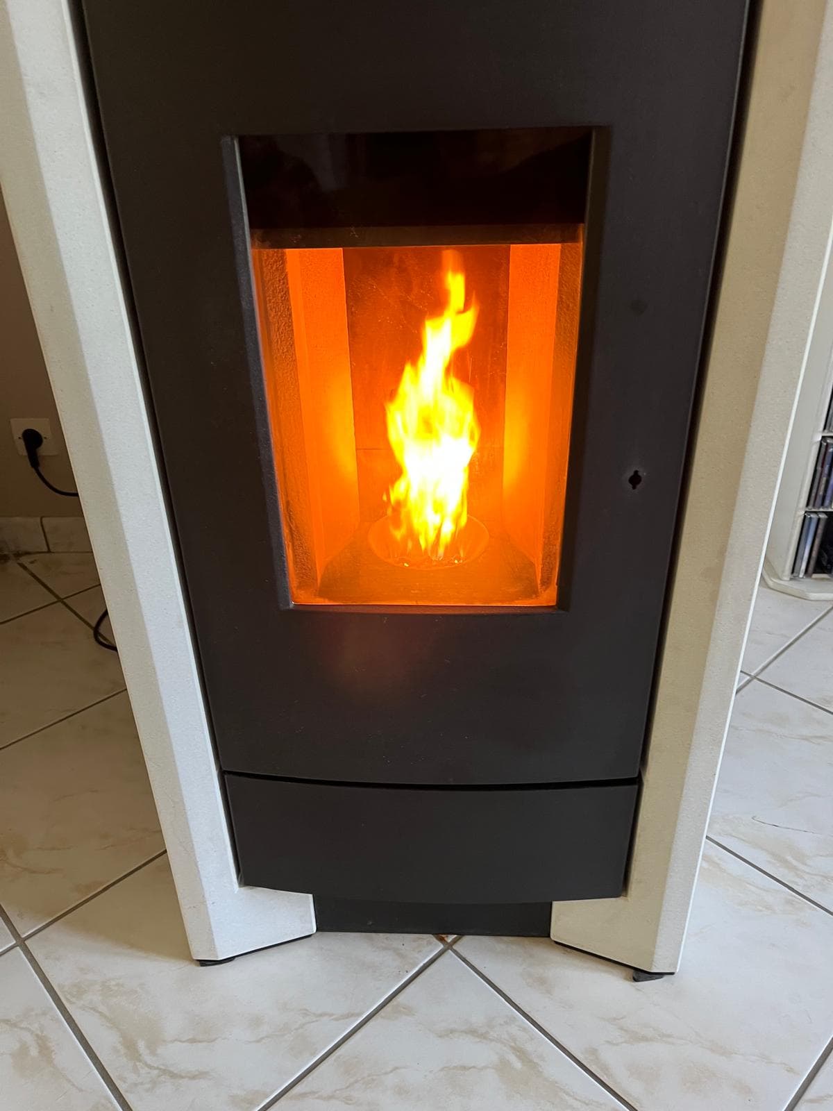 Entretien d'un poêle à granulés par ADT Climatisation Chauffage